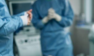An Unconscious Female Patient Lying on an Operating Table