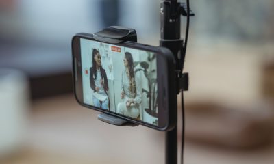 Phone recording video of talking women