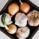 onion and garlic on tray