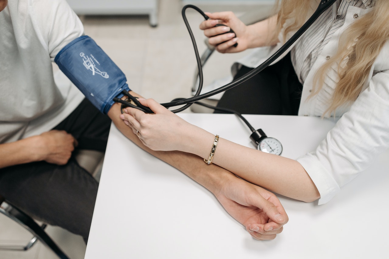 taking blood pressure
