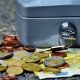 Banknotes and Coins Beside Gray Safety Box