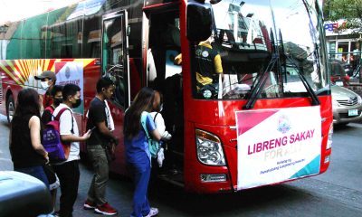 commuters entering a bus