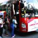 commuters entering a bus