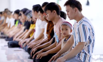 Muslim kneeling for prayer