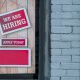 "We are hiring" post on door