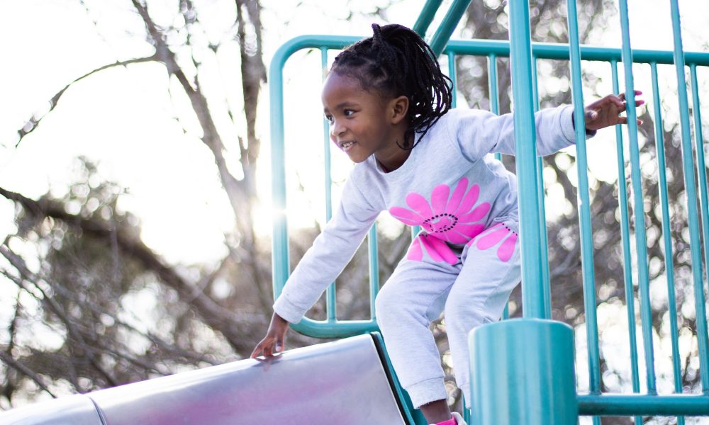 child playing on a playground