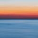 Calm Body Of Water During Golden Hour