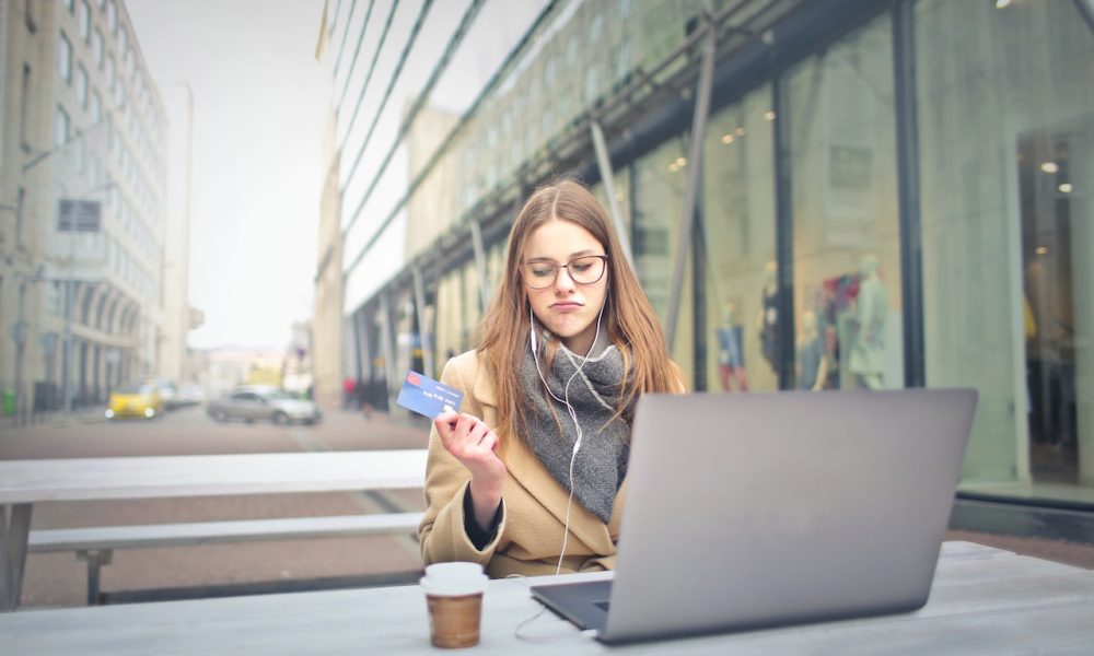 woman holding bank card