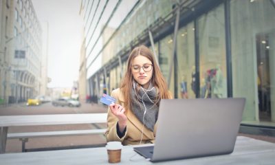 woman holding bank card