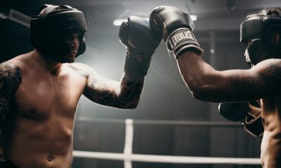 Man in Black Boxing Gloves