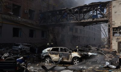 Building and Car Damaged by Fire