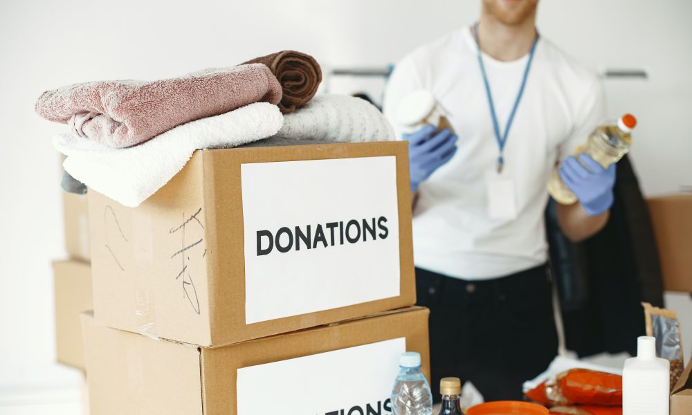 Close-up Photo of Donation Boxes