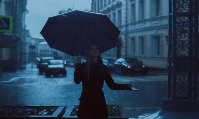 Woman Holding Umbrella