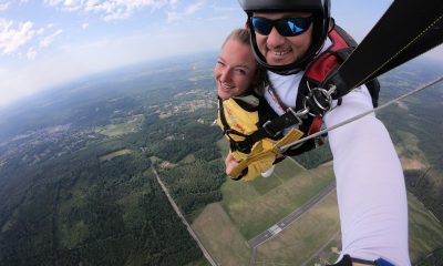 Man and Woman Parachute Jumping Selfie