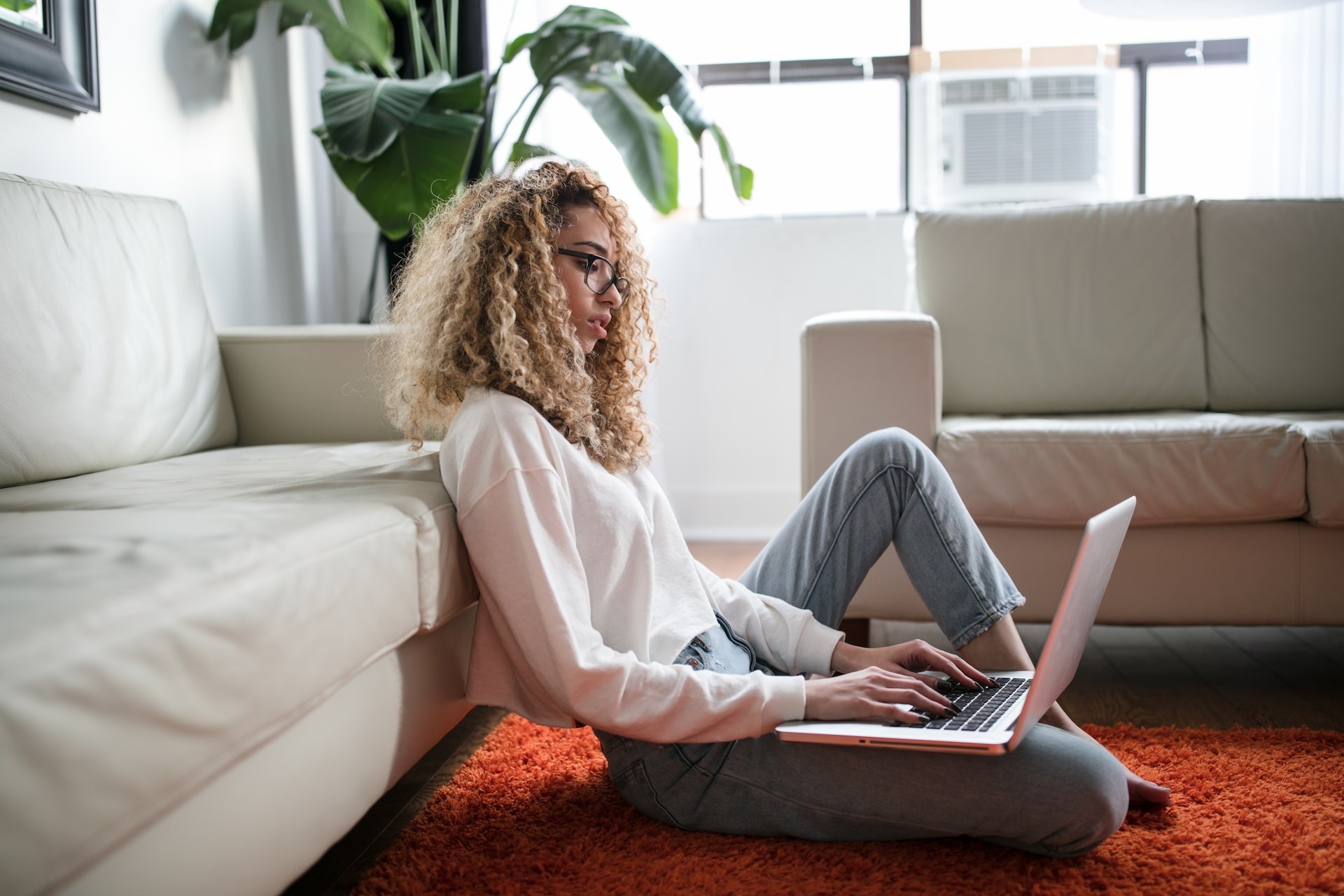 woman sitting working on laptop