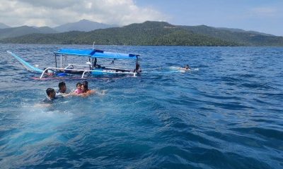 people swimming to rescue