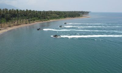 ships heading towards the shore