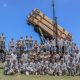 armies pose for photo