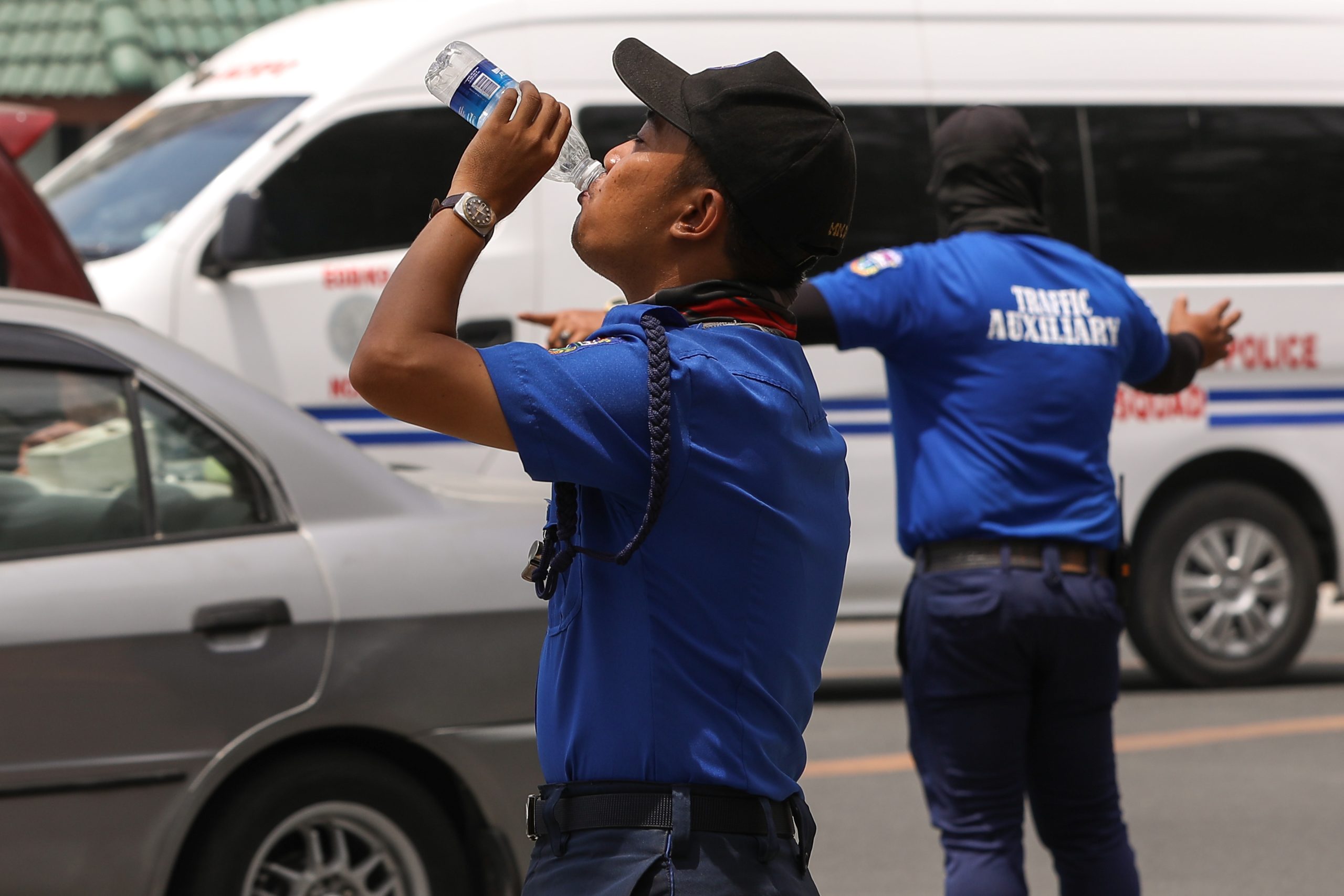 traffic enforcer drinking water