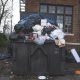 overflowing trash bin