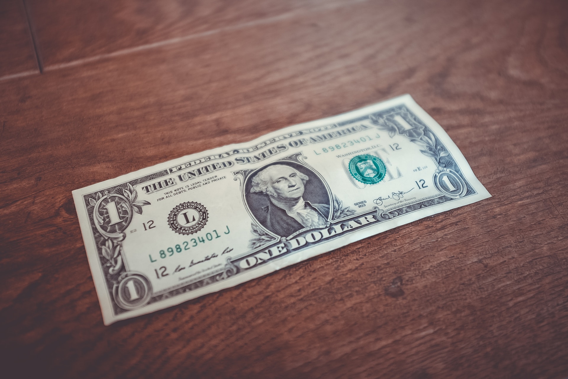 dollar bill on table