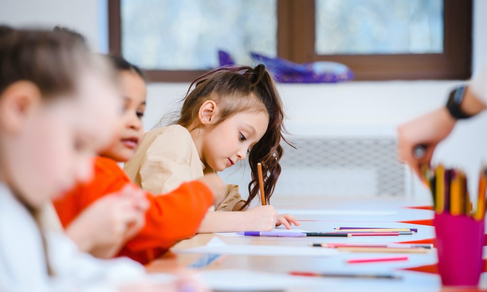 A Young Girl using a Coloring Pen