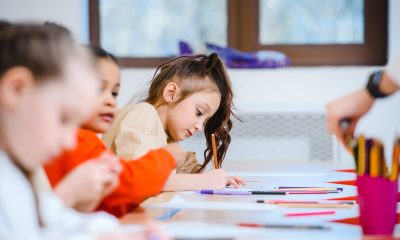 A Young Girl using a Coloring Pen