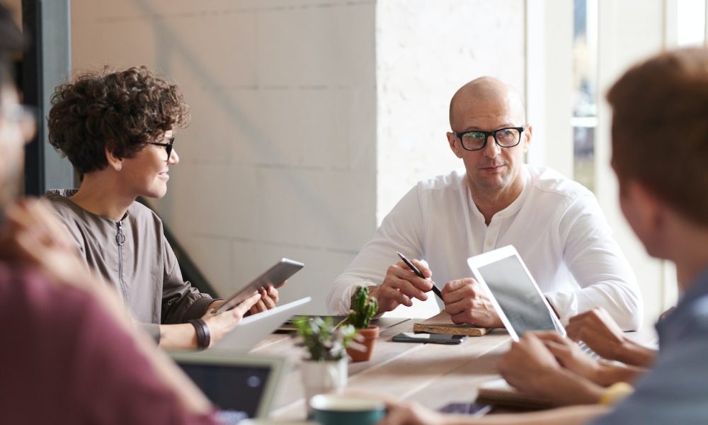 people talking in a meeting
