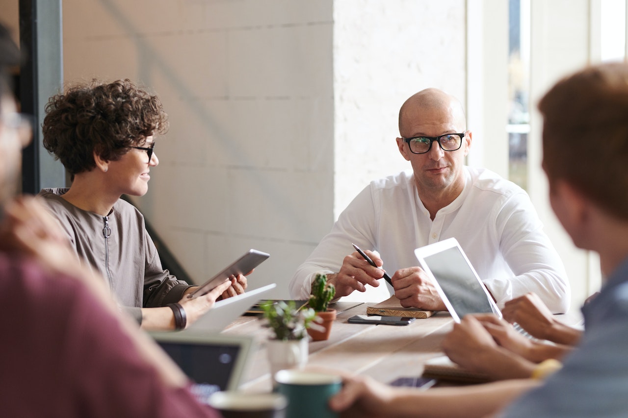 people talking in a meeting