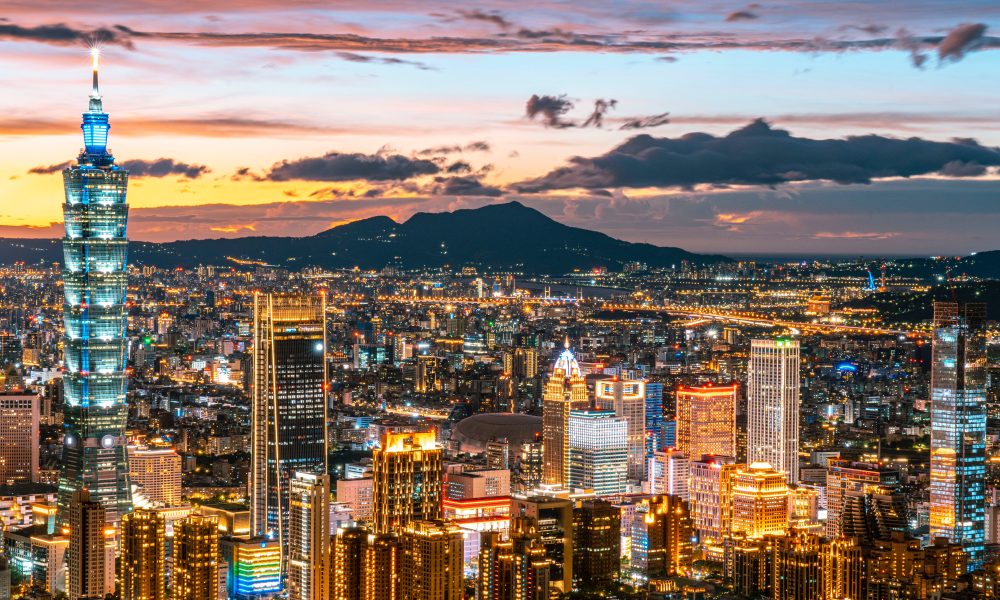 Aerial View of City Buildings and Taipei 101 during Night Time