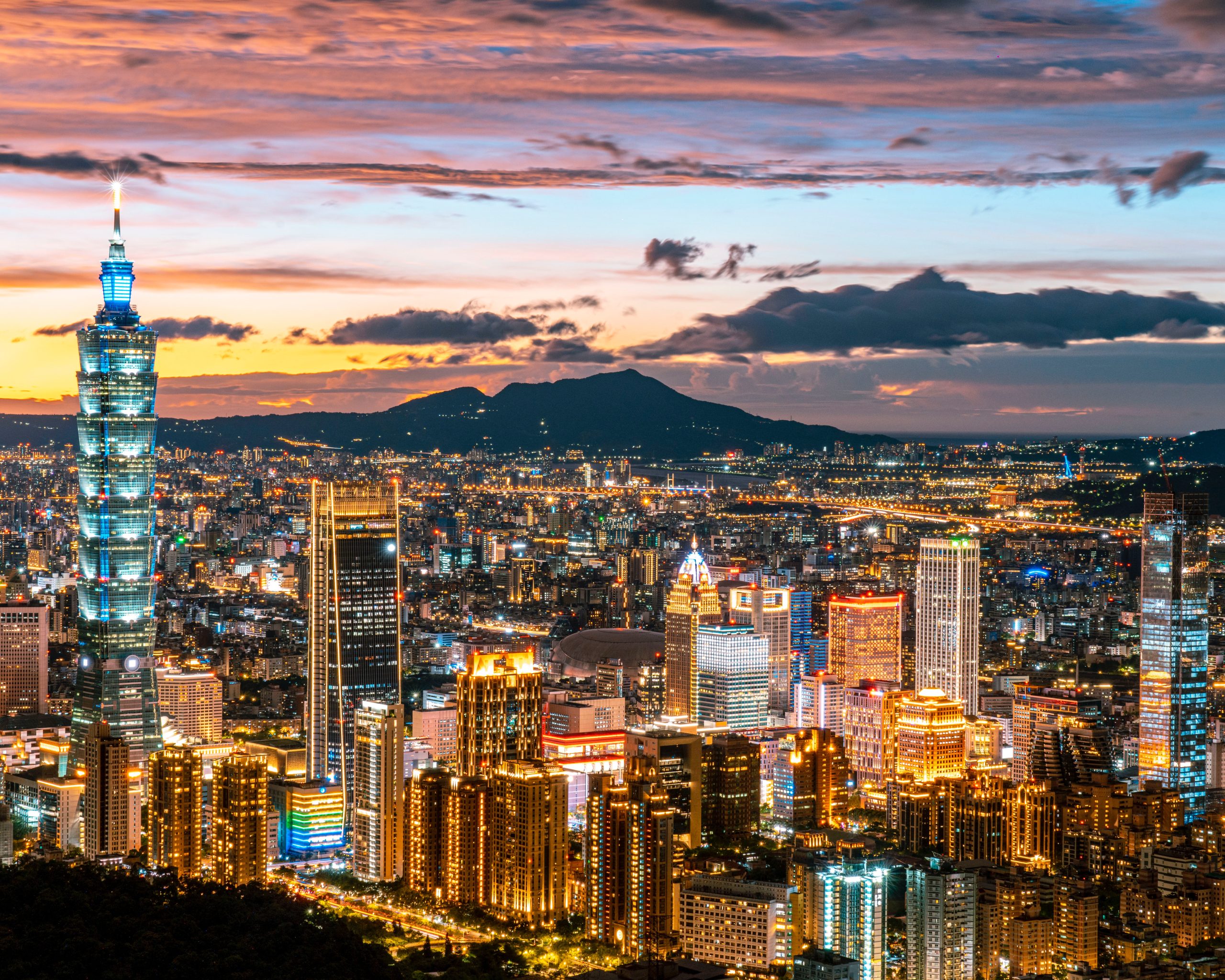 Aerial View of City Buildings and Taipei 101 during Night Time