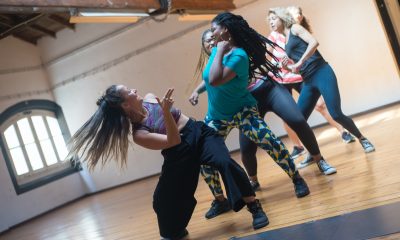 3 Women Dancing on Brown Wooden Floor