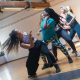 3 Women Dancing on Brown Wooden Floor