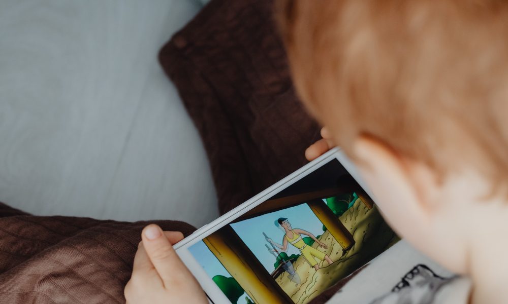 Little Boy Watching Cartoons on Phone