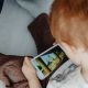 Little Boy Watching Cartoons on Phone