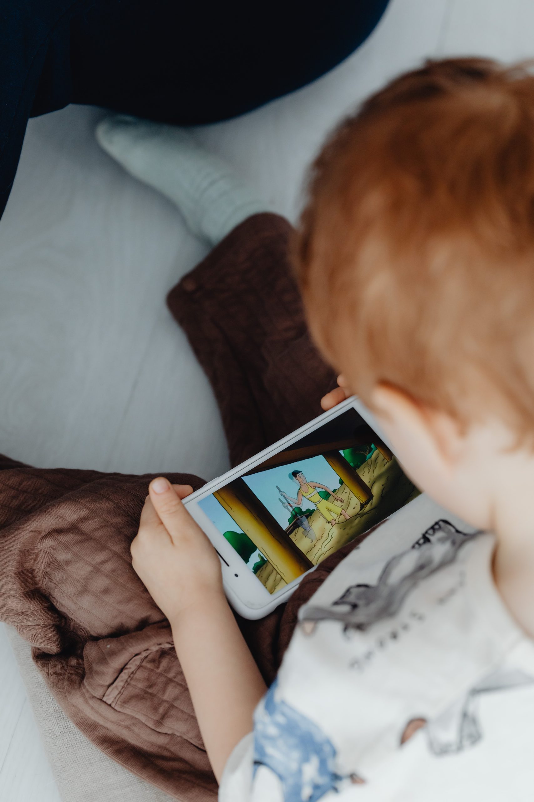 Little Boy Watching Cartoons on Phone