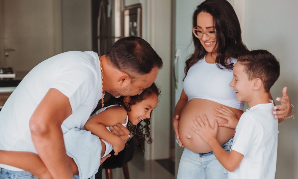 Happy Family with Pregnant Mother
