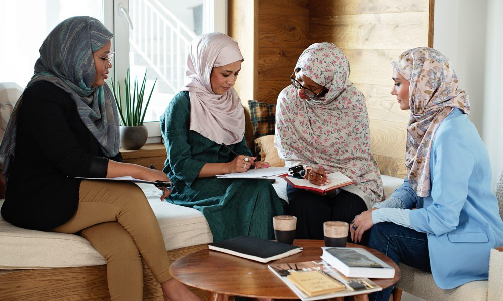 Women in Hijab Working Together