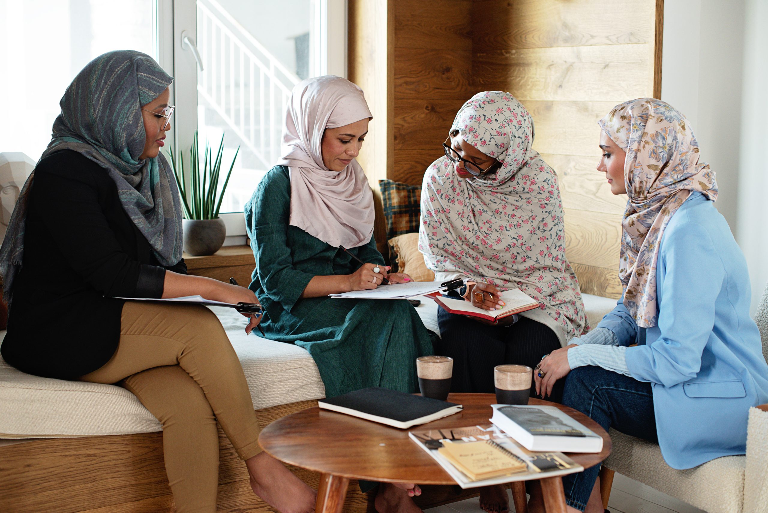 Women in Hijab Working Together