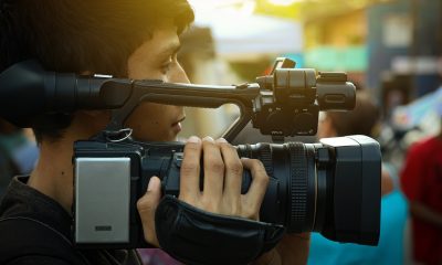a man holding a camera
