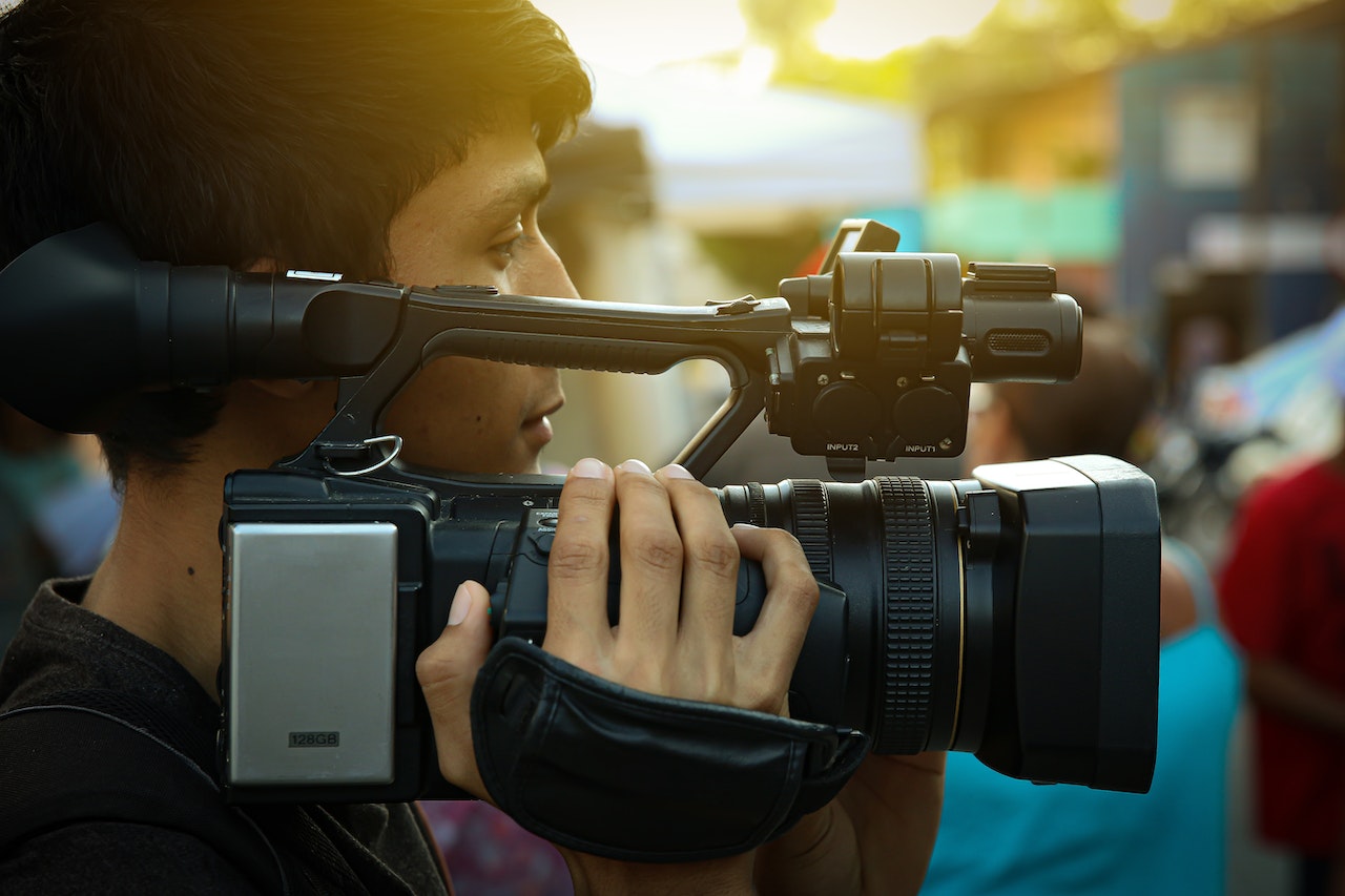 a man holding a camera