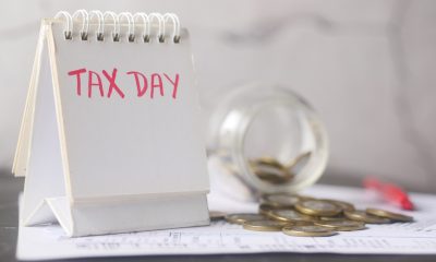 tax day written on standing calendar