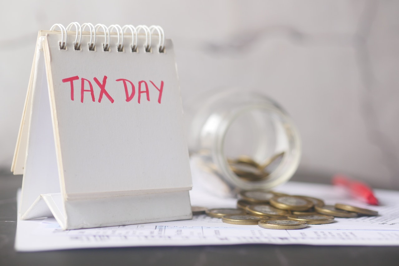 tax day written on standing calendar