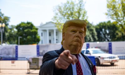 Trump's impersonator wearing a Trump mask