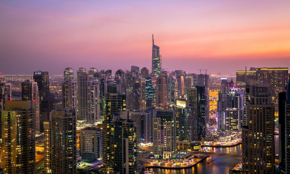 aerial view of city night lights in Dubai