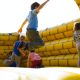 kids playing on inflatable castle