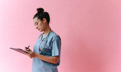 A Doctor Taking Notes