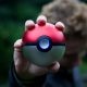 Person Holding Pokemon Ball Toy
