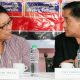Manila Economic and Cultural Office chief Silvestre Bello III (left) chats with Foreign Affairs Assistant Secretary for Migrant Workers Affairs Paul Cortes
