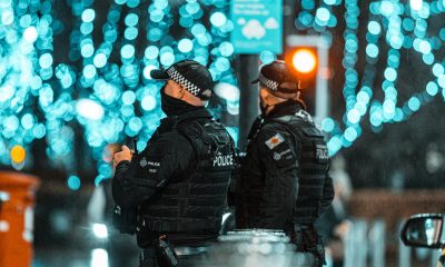 two canada policemen standing